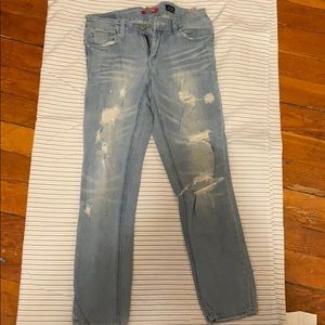 COPY - Ripped light wash jeans. Mid rise